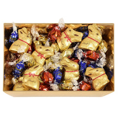 Buntes Lindt Schokoladen-Osternest | 310 g | 8 x Mini-Goldhasen, 26 x Lindor Milchschokolade-Eier, 15 x Lindor weiße Schokoladeneier, 10 x Lindor dunkle Schokoladeneier | Osterschokolade | Geschenk aus Schokolade