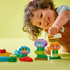 LEGO DUPLO Town Creative Flower Garden, Jucărie stivuibilă, Permite copiilor mici de la 2 ani să se joace imaginativ, Set de construcție pentru a promova dexteritatea, Jucărie educativă pentru copiii preșcolari 10444 Seturi de constructie Besuche den LEGO-Store