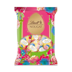 Eier Lindt Nougat Edition Blume 90g | Haselnussnougat in feiner Vollmilchschokolade | Frühlingsdesign-Ostereier | Osterschokolade | Schokoladeneier | Geschenk aus Schokolade | Geschenkidee