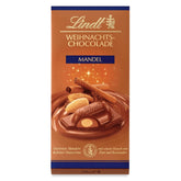 Baton de ciocolată Lindt cu migdale de Crăciun | 100 g | Migdale în cremă de nuci acoperite cu cea mai fină ciocolată cu lapte | Cadou de ciocolată de Crăciun