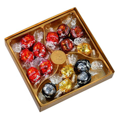 Lindt LINDOR Geschenkbox mit verschiedenen Pralinen, ca. 15 LINDOR-Trüffel, 4 Sorten (Milchschokolade, weiße Schokolade, dunkle Schokolade 60 % und Haselnuss), 187 g