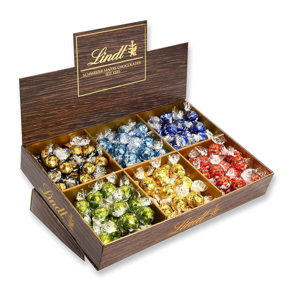 Lindt Schokolade LINDOR, Thekendisplay | 1718 g | Ca. 138 Trüffel in den Sorten Milch, Schwarz 70 %, Halbbraun, Stracciatella, Weiß, Pistazie | Schokoladen-Geschenkset | Geschenkschokolade | Großpackung