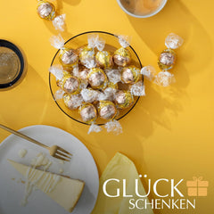 Lindt-Schokolade | LINDOR Käsekuchenbeutel | 1 kg | 80 Kugeln aus weißer Milchschokolade mit zartschmelzender Käsekuchenfüllung | Schenken Sie Schokolade zum Teilen