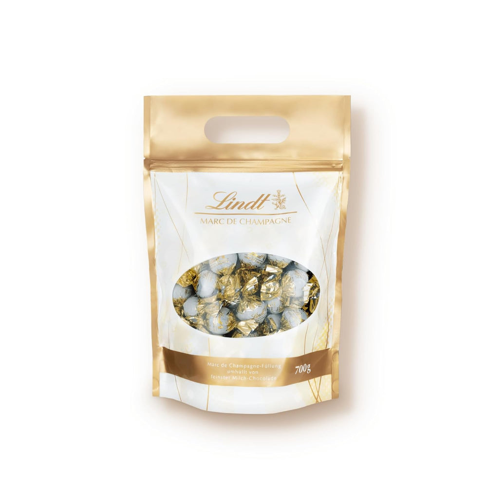 Lindt Marc de Champagne Schokoladenkugeln | 700 g ca. 56 Milchschokolade-Bonbons mit raffinierter Füllung, enthält Alkohol | Großpackung | Geschenk aus Schokolade | Schokoladengeschenk