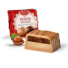 Plăcintă cu ciocolată și trufe Reber Bites, trufe cu brandy pe nuga cremoasă, acoperită cu ciocolată delicată cu lapte alpină, 40g (1 bucată)