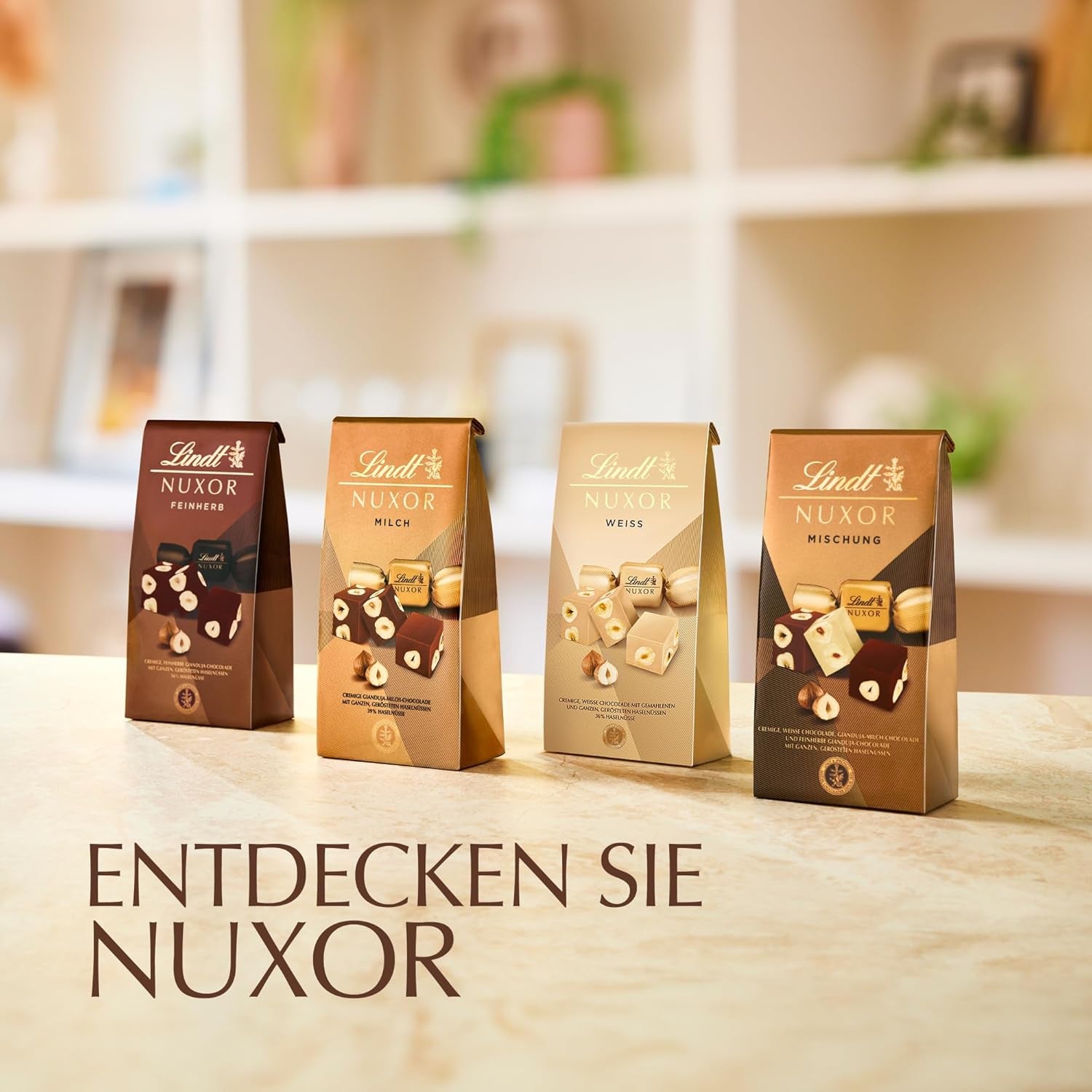 Lindt-Schokolade | NUXOR Milchschokolade-Beutel | 103g | Cremige Gianduja-Milchschokoladenwürfel mit gerösteten Haselnüssen | Schokoladengeschenk
