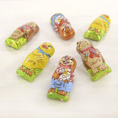 Kleine Osterfreunde mit Schokolade | 2 x 100 g und Schokoladendekor Mini-Eier mit Alpenmilch | 2 x 180 g Beutel | Eier aus hochwertiger Vollmilchschokolade, fröhlich und bunt verpackt, in vier Farben zu Ostern