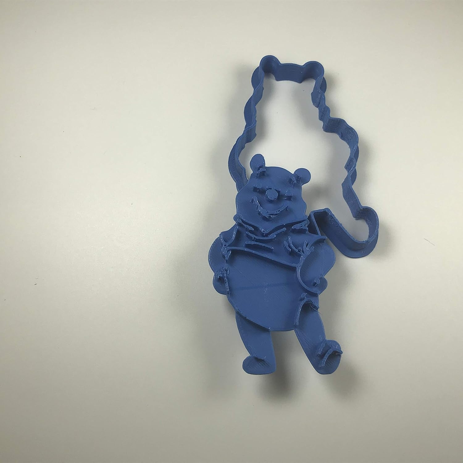 2 forme de biscuiți Winnie the Pooh, albastre