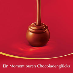 Prezentare de blat Lindor cu ciocolată | 1718 g și batoane de ciocolată cu marțipan | 25 batoane x 50 g într-un prezentare de blat | 1250 g | Marțipan pur acoperit cu ciocolată neagră | Batoane de ciocolată