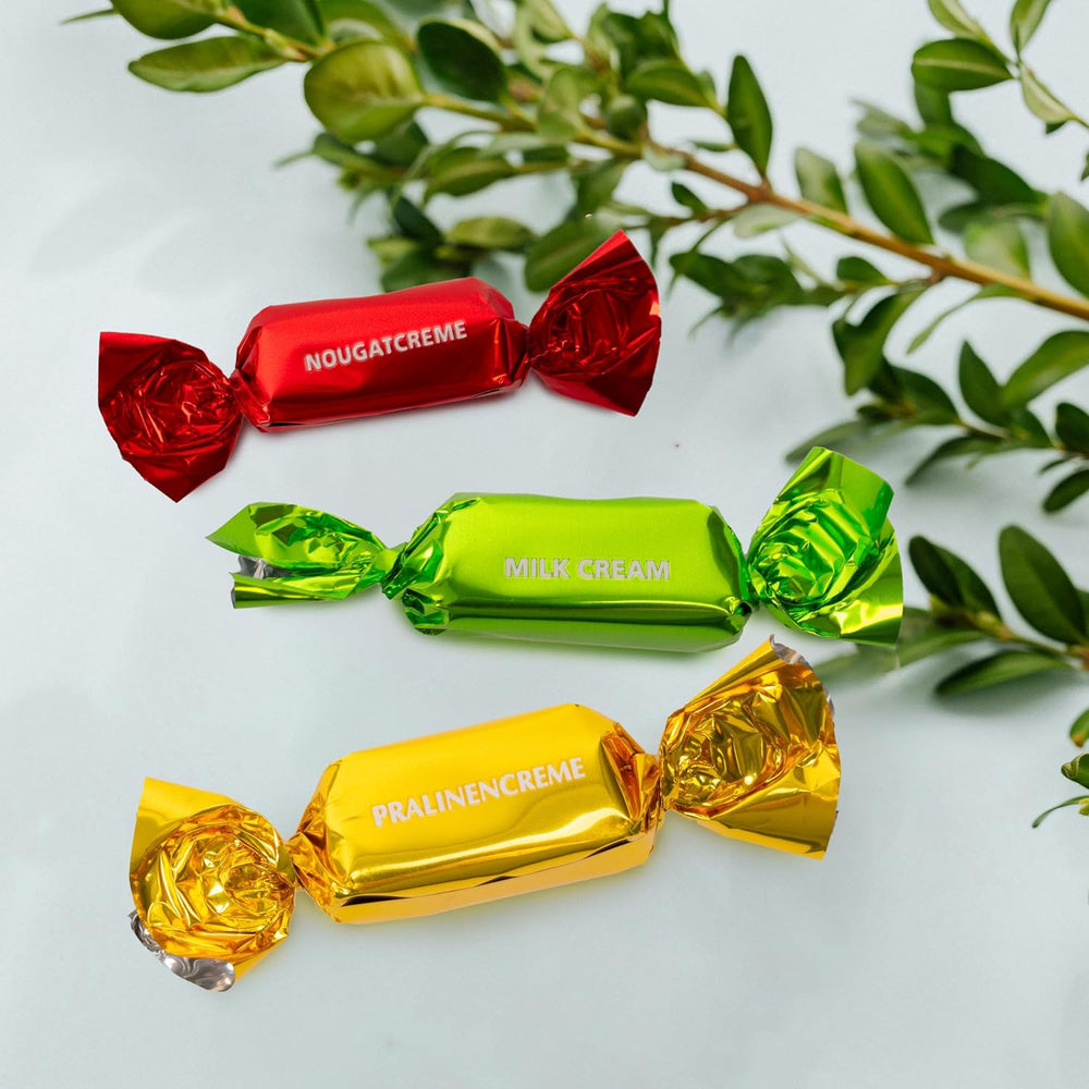 Heidel Osterkarten-Geschenkbox 183g, Premium-Milchschokolade-Praline mit dekorativer Metallbox, ideal als Ostergeschenk