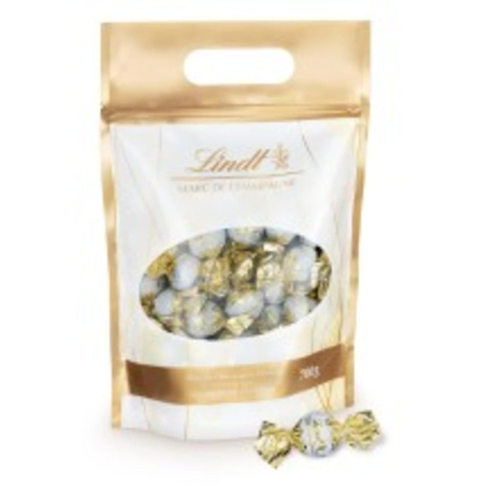 Lindt Marc de Champagne Schokoladenkugeln | 700 g ca. 56 Milchschokolade-Bonbons mit raffinierter Füllung, enthält Alkohol | Großpackung | Geschenk aus Schokolade | Schokoladengeschenk