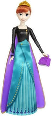 Mattel Disney Die Eiskönigin Anna Modepuppen-Set, Spin & Reveal mit 11 Überraschungen, darunter 5 Accessoires, 5 Sticker und eine Szene zum Spielen, vom Disney-Film inspiriert, HXD27