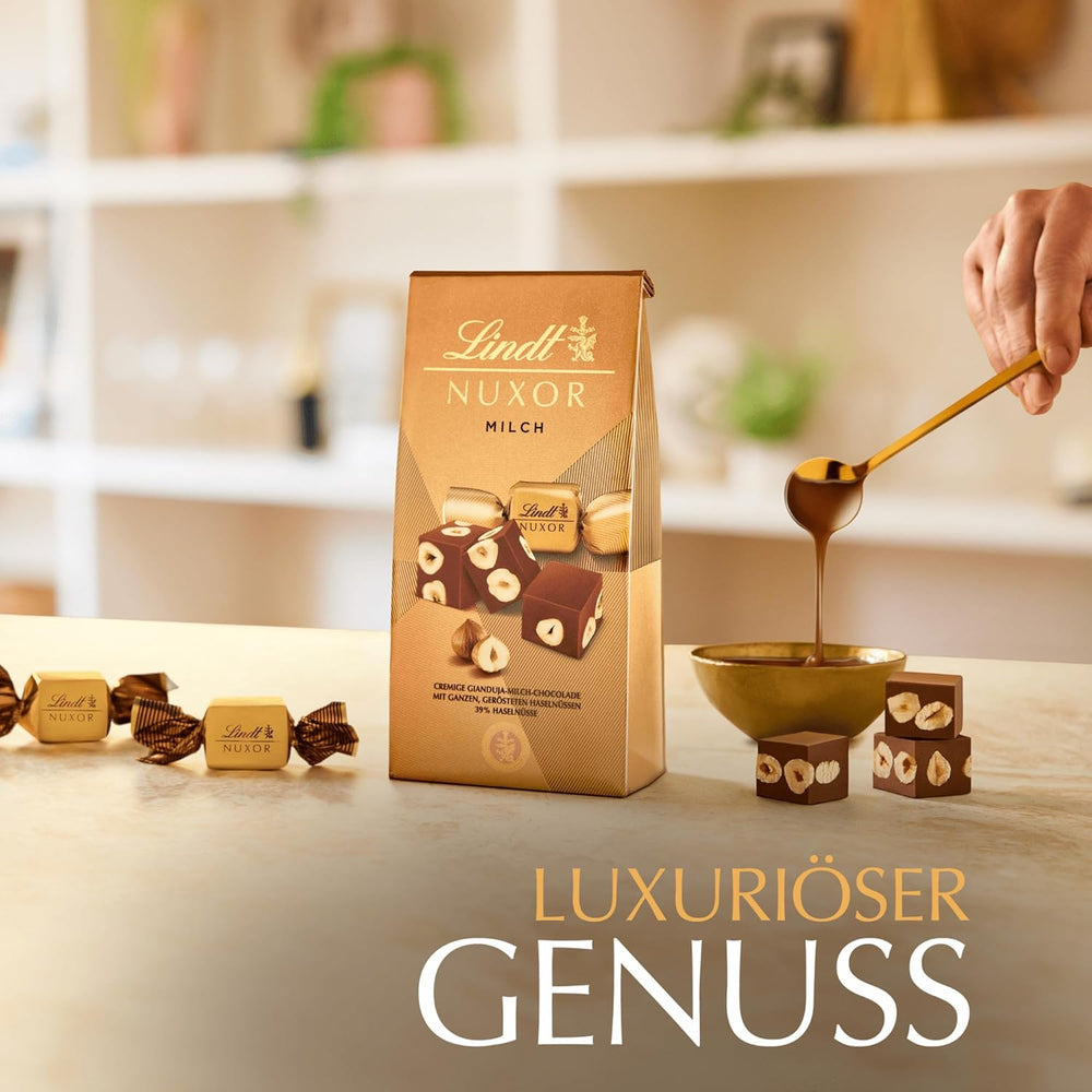 Lindt-Schokolade | NUXOR Milchschokolade-Beutel | 103g | Cremige Gianduja-Milchschokoladenwürfel mit gerösteten Haselnüssen | Schokoladengeschenk