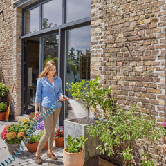 Set complet furtun spiralat Gardena 4647-20, cu retragere automată a furtunului, cu duză de pulverizare și racord robinet (lungime furtun: 10 m, diametru furtun: 9 mm, set: da)