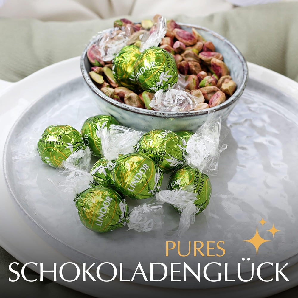 Lindt LINDOR Schokolade mit Pistazien | 1 kg wiederverschließbarer Beutel | ca. 80 Milchschokoladenkugeln mit zartschmelzender Pistaziencremefüllung | Großpackung, Pralinengeschenk