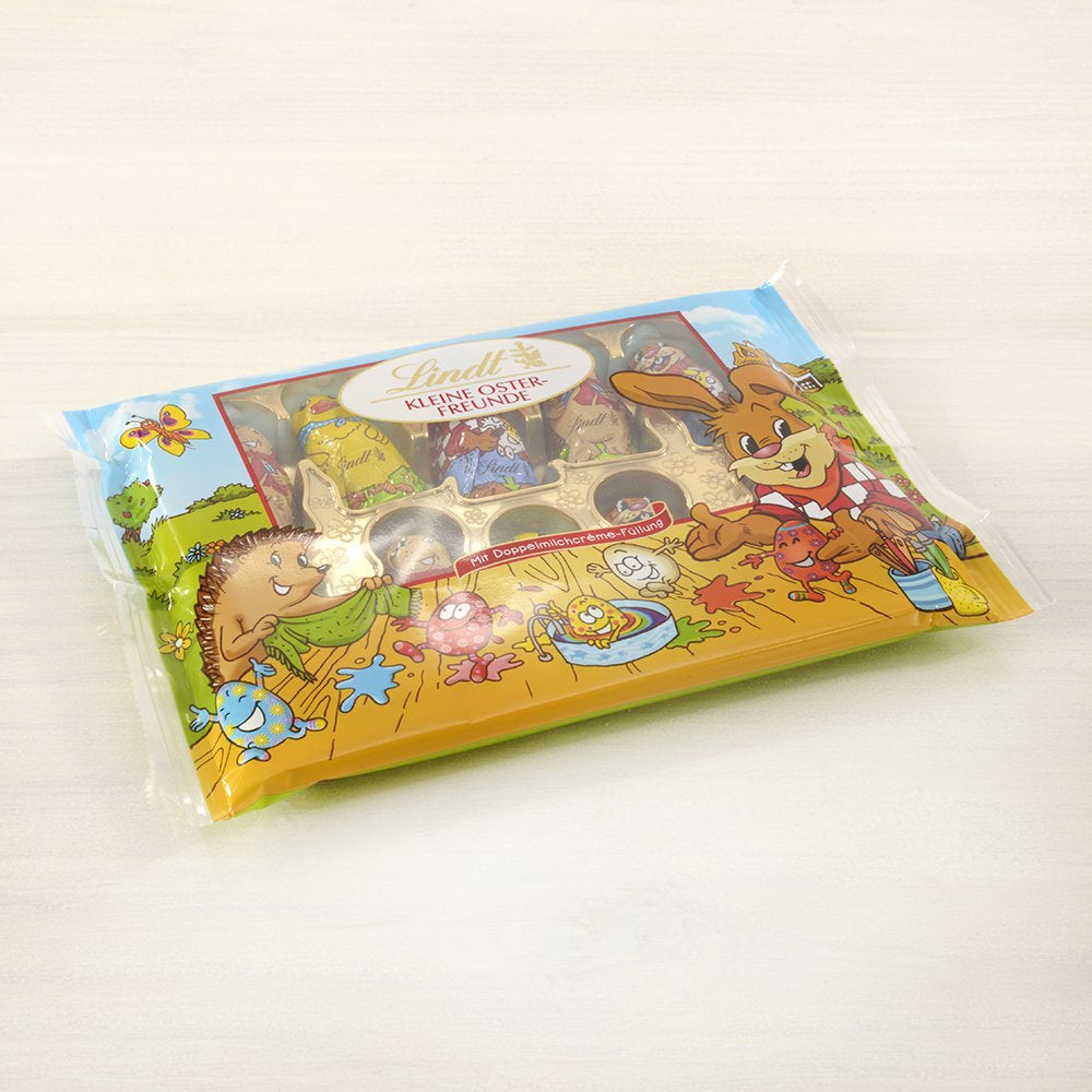 Kleine Osterfreunde mit Schokolade | 2 x 100 g und Schokoladendekor Mini-Eier mit Alpenmilch | 2 x 180 g Beutel | Eier aus hochwertiger Vollmilchschokolade, fröhlich und bunt verpackt, in vier Farben zu Ostern