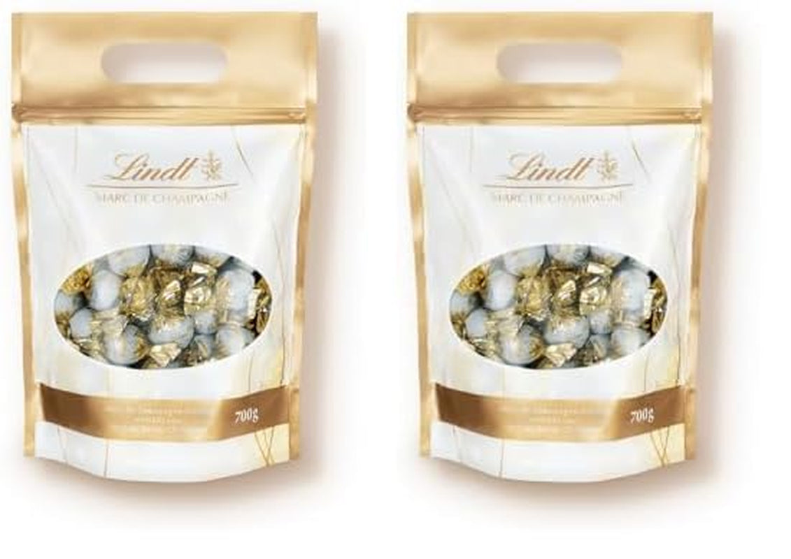 Lindt Marc de Champagne Schokoladenkugeln | 700 g ca. 56 Milchschokolade-Bonbons mit raffinierter Füllung, enthält Alkohol | Großpackung | Geschenk aus Schokolade | Schokoladengeschenk