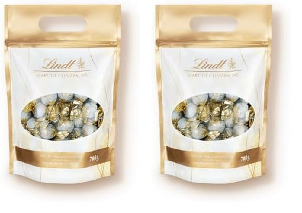 Lindt Marc de Champagne Schokoladenkugeln | 700 g ca. 56 Milchschokolade-Bonbons mit raffinierter Füllung, enthält Alkohol | Großpackung | Geschenk aus Schokolade | Schokoladengeschenk