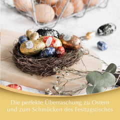 LINDOR-Eier mit Lindt-Schokolade | 4 Kartons à 450 g | LINDOR-Eier mit zartschmelzender Vollmilchschokolade, weißer, dunkler und Haselnussfüllung | Osterschokolade | Geschenk aus Schokolade | Ostereier | Schokoladeneier