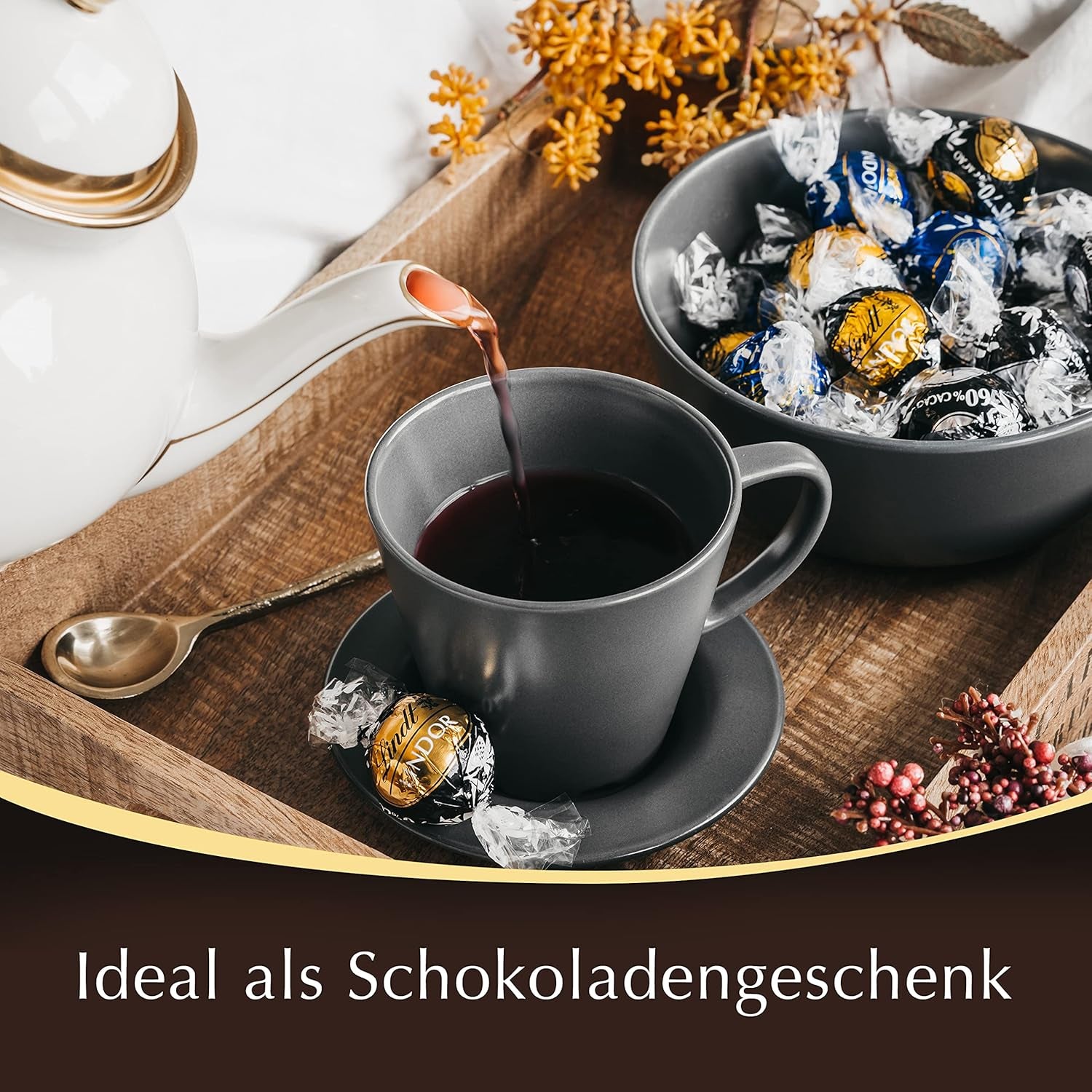 Lindor Schokokugeln 70 % extra dunkler Kakao | 137g Beutel | Ca. 10 Kugeln feiner Zartbitterschokolade mit zartschmelzender Füllung | Geschenk aus Schokolade | Schokoladengeschenk
