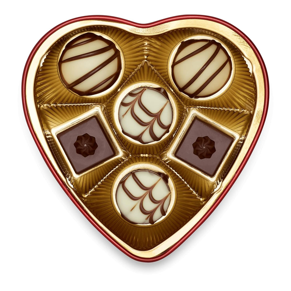 Lindt Schokolade von Herzen | 30 g | 6 Pralinen in Marc de Champagne, Coeur à l'Orange, knuspriger Milchschokolade, Orangen-Marzipan in einer wunderschönen herzförmigen Schachtel | Geschenk aus Schokolade | Schokoladengeschenk