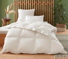 Badenia Trendline Eco warme Bettdecke mit 90 % Daunen und 10 % Federn Klasse I, 135 x 200 cm, weiß, Öko-Tex-zertifiziert, hergestellt nach dem deutschen Qualitätsstandard Bettdecken und Steppdecken Naty Shop 135 x 200 cm Warme Winterdecke