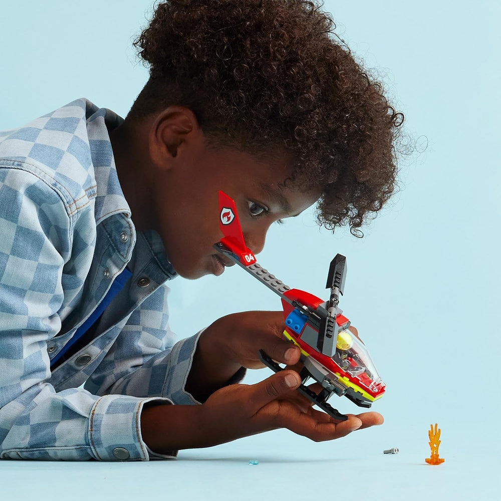 LEGO City Feuerwehrhubschrauber, Hubschrauberspielzeug und Pilotenfigurenset, Feuerwehrhubschrauber für ein fantasievolles Spielerlebnis, Geschenk für Kinder, Jungen und Mädchen ab 5 Jahren 60411 Bausets Besuchen Sie den LEGO-Store