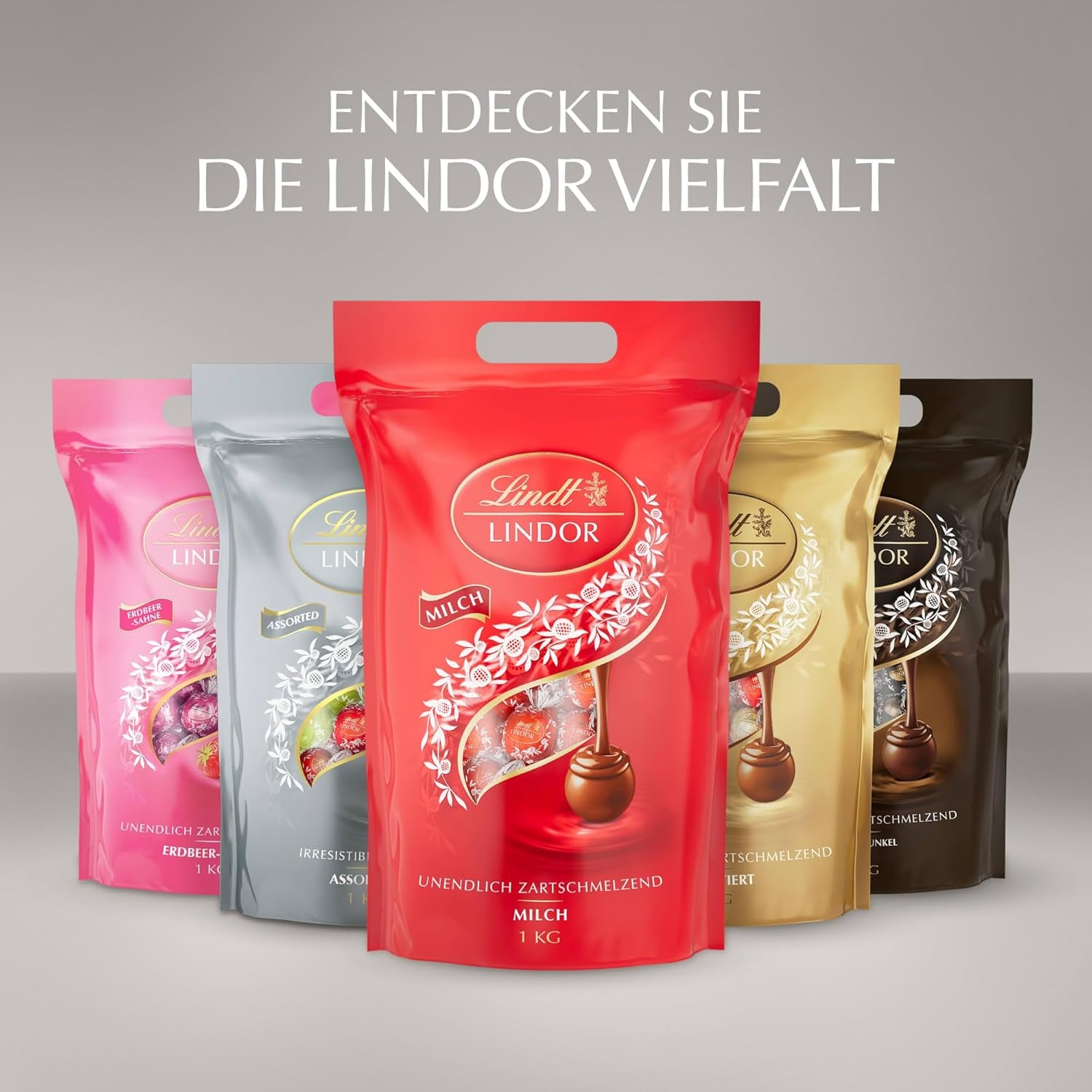 Lindt-Schokolade | Sortierte Tasche LINDOR silber | 1 kg Beutel | 80 zartschmelzende Milchschokoladenkugeln, 70 %, gesalzener Karamell und doppelter Schokoladengeschmack | Schenken Sie Schokolade zum Teilen