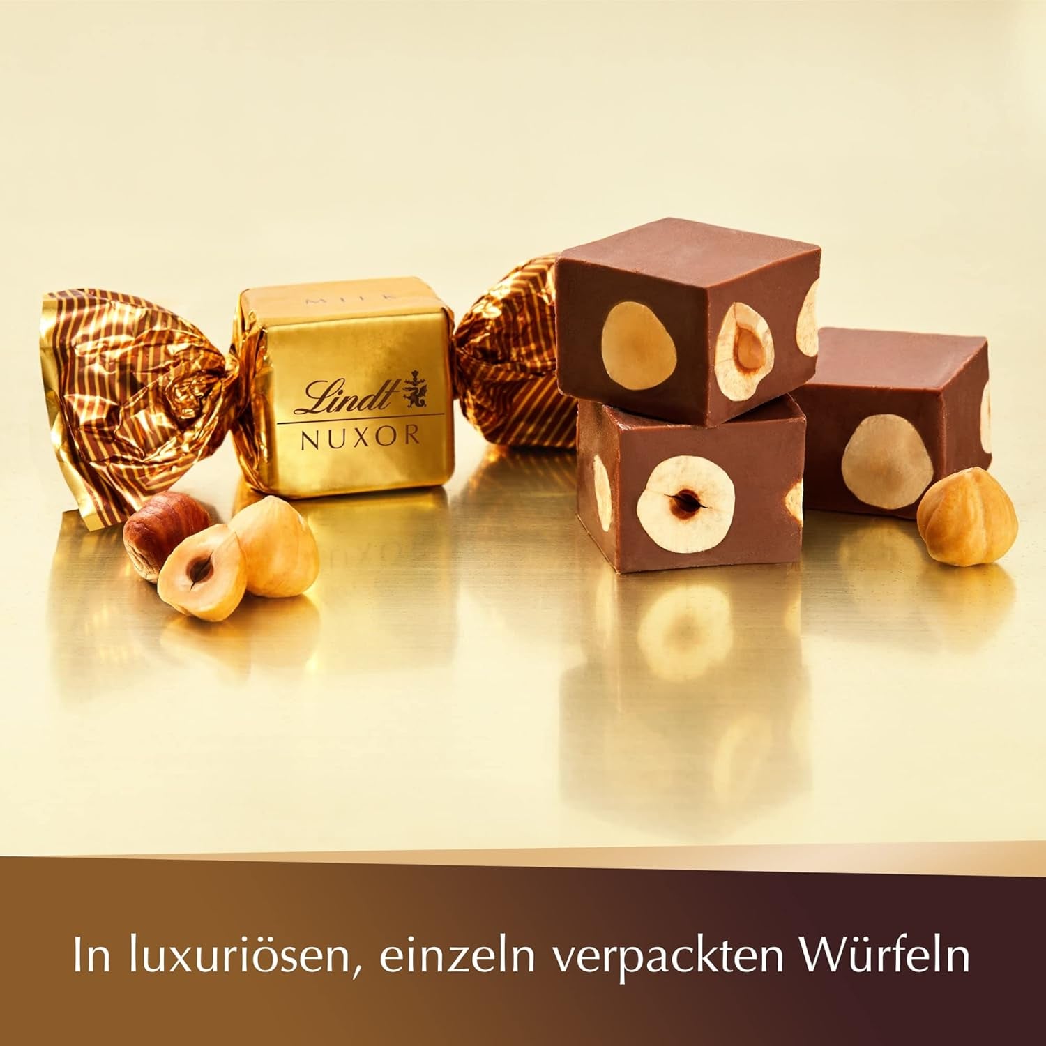 Lindt-Schokolade | NUXOR Milchschokolade-Beutel | 103g | Cremige Gianduja-Milchschokoladenwürfel mit gerösteten Haselnüssen | Schokoladengeschenk